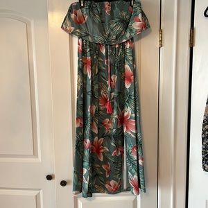 Brand new never worn. Two small slots in the front